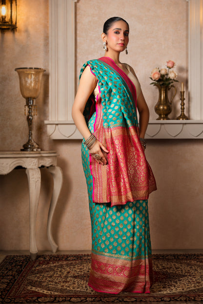 Khaddi Silk Georgette Copper Zari Banarasi Saree – Teal & Magenta Border